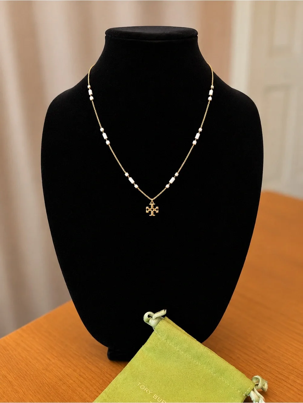 Tory Burch Gold Logo Pendant Necklace with White and Black enamel Accents